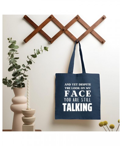 Funny and yet Despite the look on my face you are still Talking sarcastic saying Navy Black Multicolor Canvas Tote Bag $17.00...